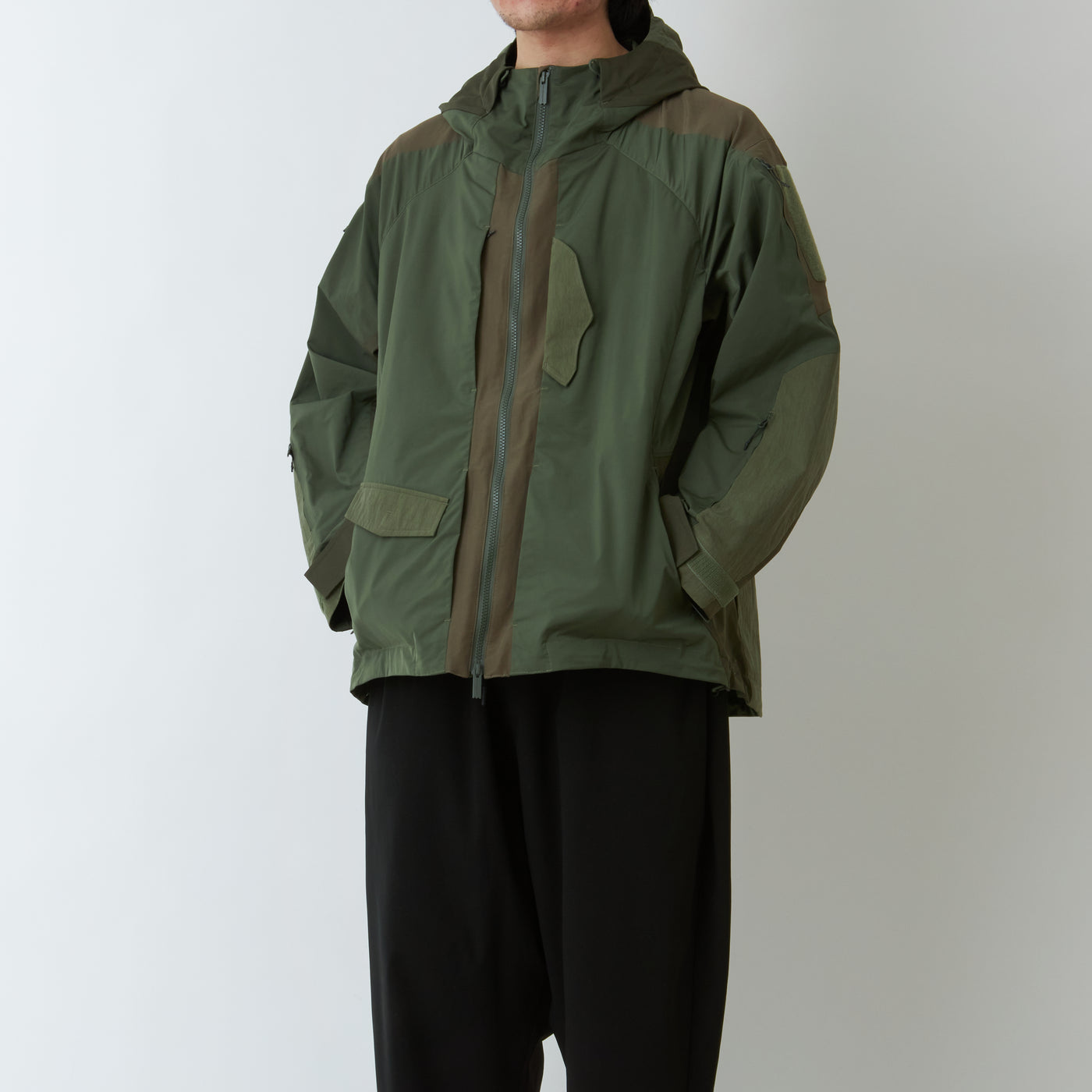 WHITE MOUNTANEERING|NEXUSⅦ. HOODED LUGGAGE PARKA